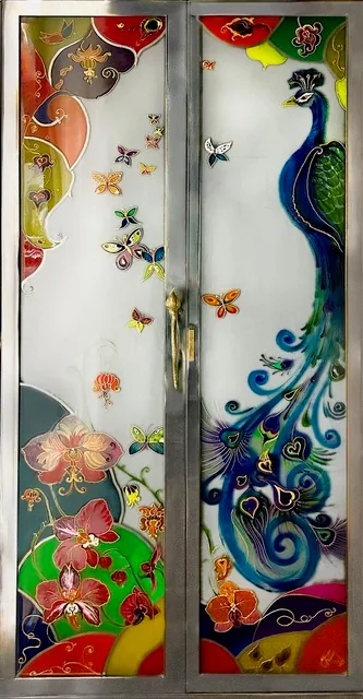 Monsieur Paon, double porte en verre brossé encadrée d’inox